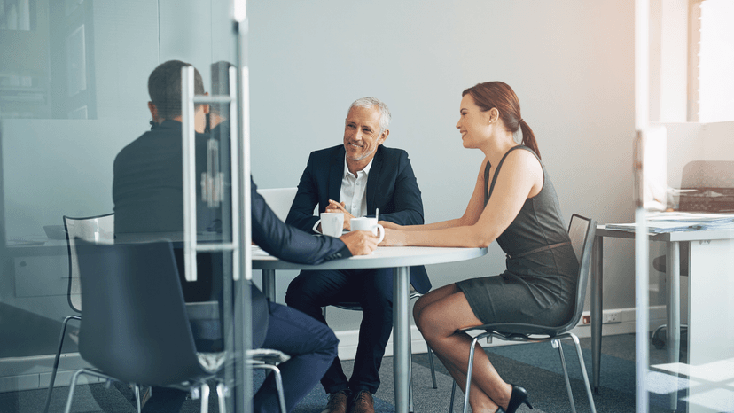 Three Business Professionals in a meeting