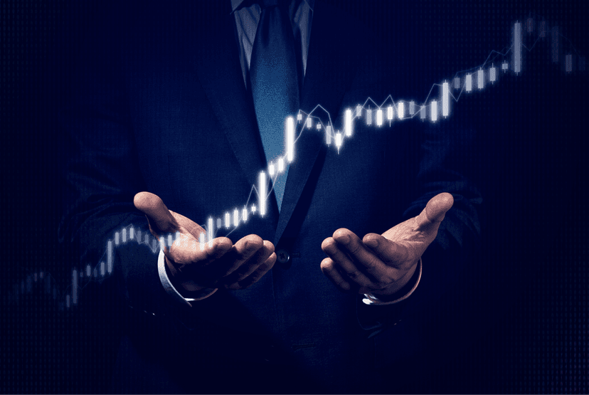 mans hands in business suit holding a graph climbing up