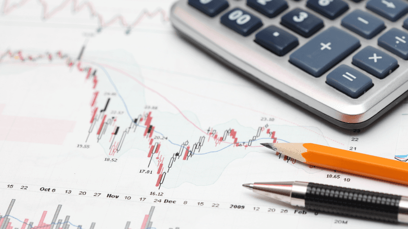 calculator, pen, pencil and graph