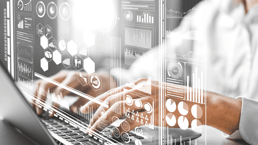 female hands at a computer with super imposed digital finance dashboard
