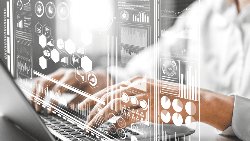 hands typing on keyboad with digital overlay