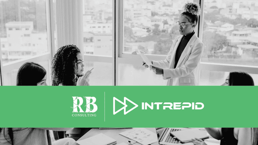 Businesswoman presenting a scalable sales strategy to team members in a modern office, representing collaboration between RB Consulting and Intrepid Finance.