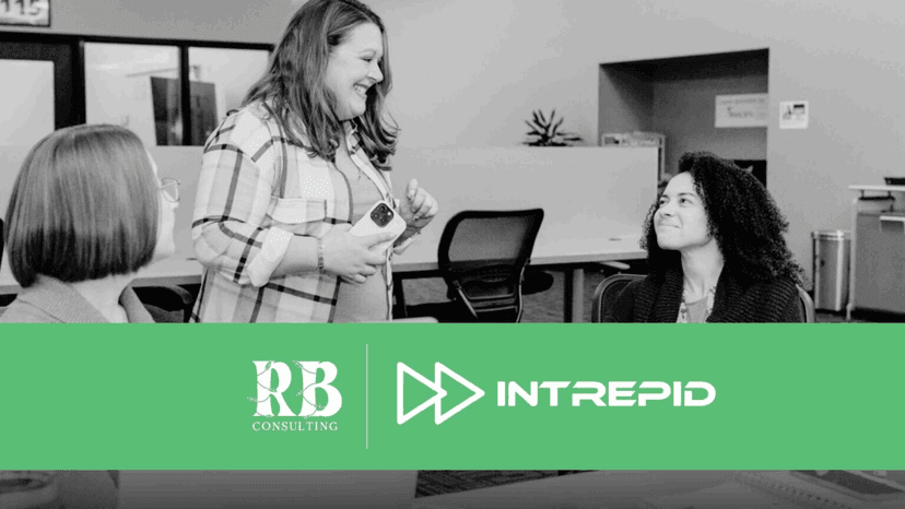 Rebecca Bormann of RB Consulting smiling and talking with colleagues during a business strategy session, co-branded with Intrepid Finance